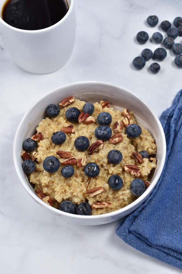Instant Pot Steel Cut Oats is an easy healthy breakfast, great for meal prep but also doable on a weekday morning. Once you start the pressure cooker, this recipe is completely hands off. Steel cut oats cook perfectly with only 4 minutes under pressure—no need to stand by the stove and stir constantly. With so many topping options, this breakfast never gets boring. 